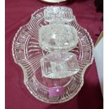 A glass dressing table set. Chipped
