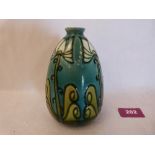 A Minton secessionist vase, number 30; tube-line decorated with stylised foliage in shades of