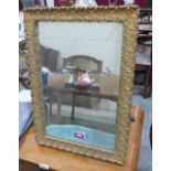 A gilt framed dressing table mirror with strut back. 19' high