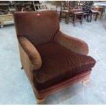 A Howard style upholstered club armchair