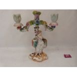 A Meissen style two light candelabrium. 9' high. Losses