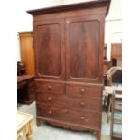 A George III mahogany linen press, with five sliding trays enclosed by a pair of panel doors. 48'