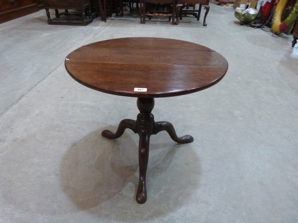 A 19th century mahogany dropleaf occasional table on tripod support. 25½' wide