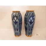 A pair of Royal Doulton Lambeth hexagonal vases with tube-lined stylised foliate decoration, no