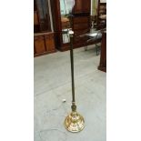 A brass lamp standard