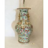 A Chinese canton famille-rose decorated vare converted as a table lamp but not drilled 17½' high