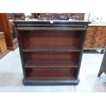 A 19th century ebonised and brass line inlaid open bookcase with two adjustable shelves on plinth