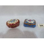 Two continental porcelain and gilt metal mounted pill boxes, each gilded and finely painted with
