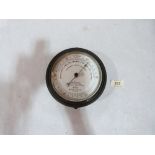 A Negretti + Zambra Fisherman's aneroid barometer. 6' diam.