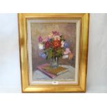 JOHN W. GOUGH BRITISH 20th CENTURY. A flowerpiece. Signed. Oil on board 16' X 12'