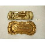 Two brass candle snuffers with trays