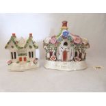 Two 19th century Staffordshire cottage pastille burners, the larger example 7' high