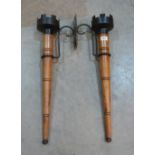 A pair of baronial style wall torches. 25' high