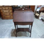 An early 20th century oak writing bureau with frieze drawer. 26' wide