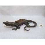 A bronze lizard pen wipe, the reptile 10' long. c.1900. Apparently unsigned