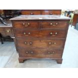 An 18th century mahogany chest, the moulded top over two short and three long graduated drawers on