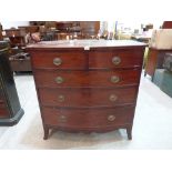 A George III mahogany bowfronted chest of two short over three long graduated drawers, raised on