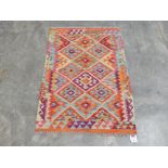 A Choli Kilim rug. 1.24m x 0.89m