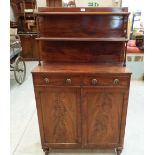 A Regency mahogany chiffonier, the raised back with two shelves, over the base with a pair of