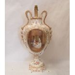 A continental two handled inverted baluster vase, converted to a table lamp, painted with a
