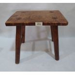 A 19th century elm stool on splayed legs. 13½' high