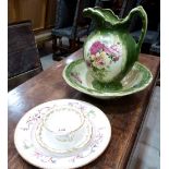 A Royal Worcester chinoiserie decorated plate, a Royal Worcester foliate gilded cup and saucer and a