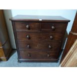 A Victorian mahogany chest of two short over three long drawers. 43' wide