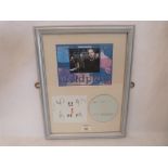 Coldplay. A photograph, C.D and autographs of the four band members. Framed