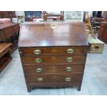 A George III oak writing bureau with four long drawers. 36' wide