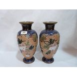 A pair of Royal Doulton Slater's Patent inverted baluster vases, decorated by Emily Partington