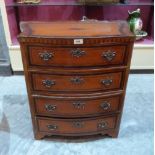 A 19th century serpentine inlaid satinwood commode chest with three drawers on bracket feet. 26½'