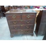 A George III oak chest with two short over three long drawers on bracket feet. 37' wide