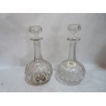 A pair of cut glass decanters. 11' high