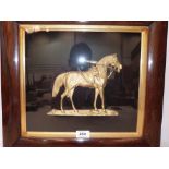 An ormolu horse relief in rosewood frame. The frame 16' X 17½'
