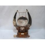 A Victorian horn and oak dinner gong. 15' high