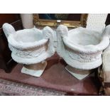 A pair of concrete garden urns. 21' high