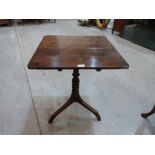 A George III oak snap-top table, the square top on ring turned column and tripod support. 22' wide
