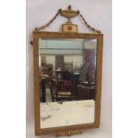 A neo-classical style gilt pier looking glass with bevelled plate. 35' high