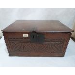A 17th century small oak chip and scratch carved chest, the interior with a till. 21' wide