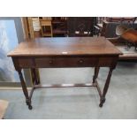 An oak side table with frieze drawer on turned legs. 39' wide