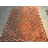 A red ground eastern rug 86' x 68' and another, tobacco ground 58' x 37'