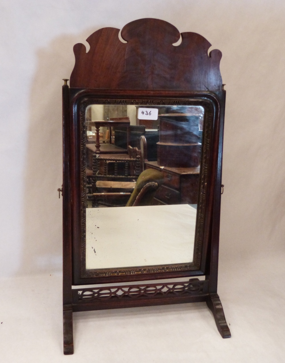 A George III style fret carved mahogany dressing table mirror. 24' high