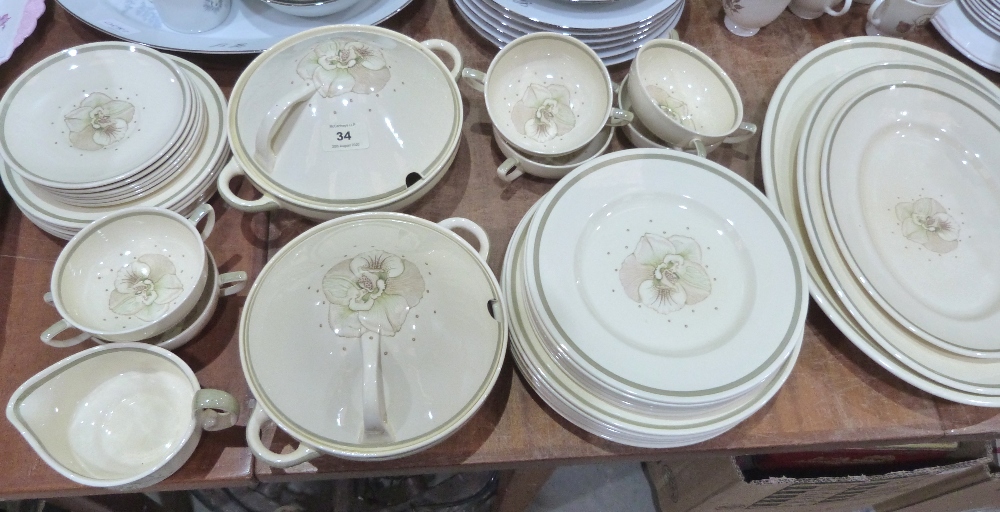 A Susie Cooper part dinner service of 36 pieces