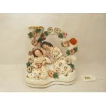 A 19th century Staffordshire spill vase group, Babes in the Woods. 6¼' high