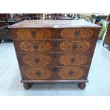 A Queen Anne walnut and seaweed marquetry chest of two short over three long graduated drawers,