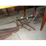 A garden plough and miscellaneous tools