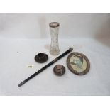 A silver photograph frame (A.F.) an ebony conductor's baton and other objects