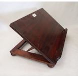 A 19th century mahogany table music stand with adjustable ratchet 17' wide