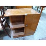 An Art-Deco style walnut island cabinet bookcase