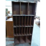 A standing open sheet music cupboard. 66' high